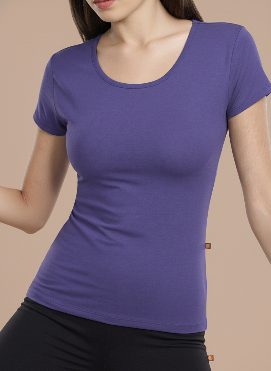Person wearing a purple t-shirt against a beige background